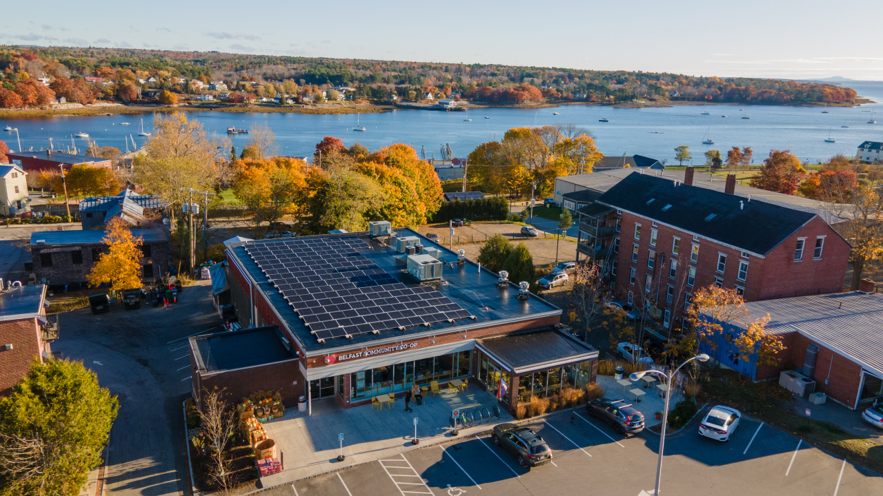 Solar on a grocery store roof near a body of water