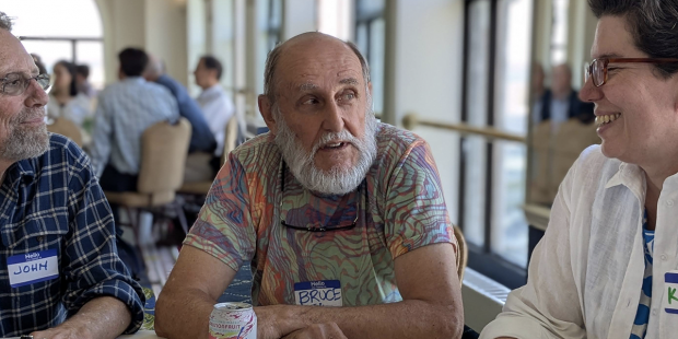 Three members of the Sustainability Society having a friendly chat